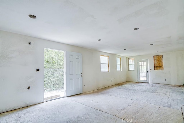 spare room featuring plenty of natural light