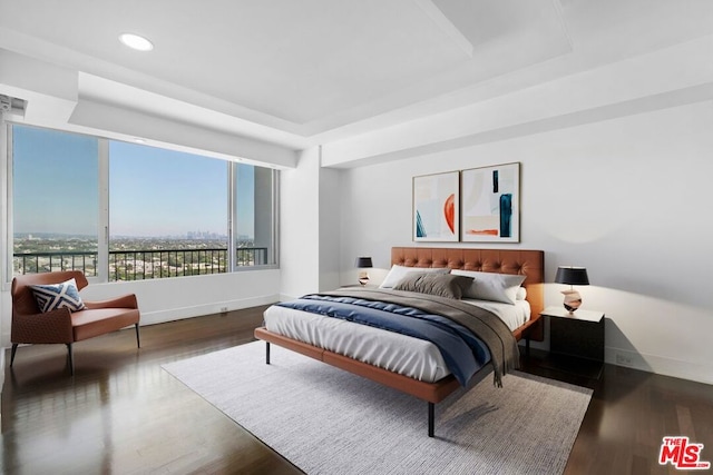 bedroom featuring wood-type flooring