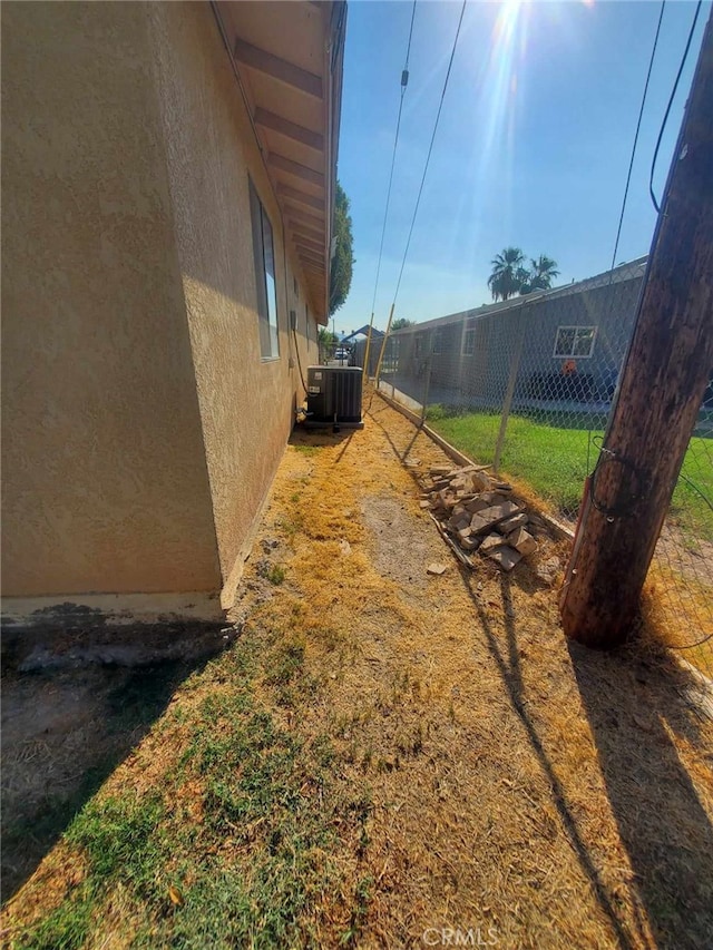 view of yard featuring cooling unit