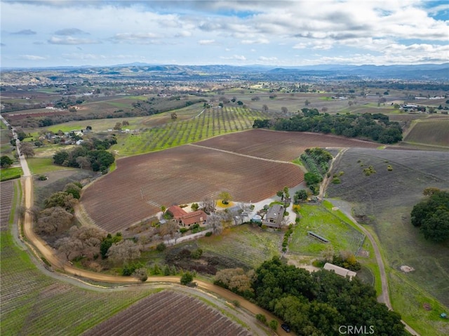 aerial view featuring a mountain view and a rural view