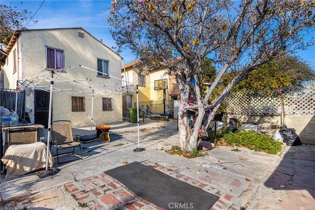 back of house featuring a patio