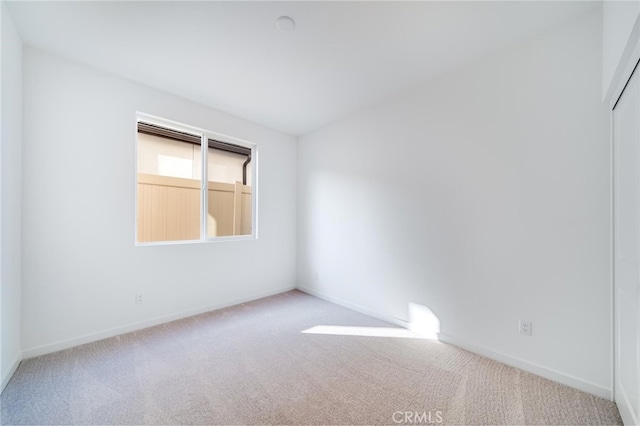 empty room featuring carpet floors