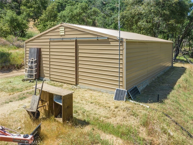 view of outdoor structure featuring a garage