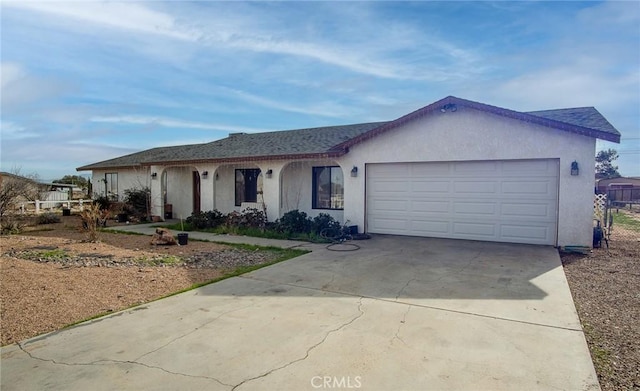 ranch-style home with a garage