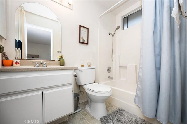 full bathroom featuring vanity, toilet, and shower / bath combo with shower curtain