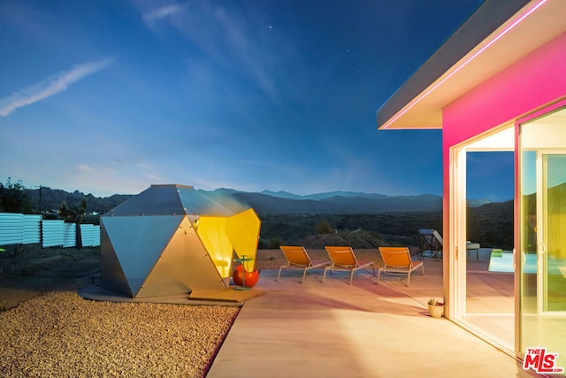 view of patio featuring a mountain view