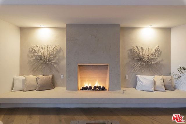 sitting room featuring hardwood / wood-style flooring