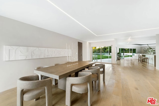 dining room featuring light hardwood / wood-style flooring