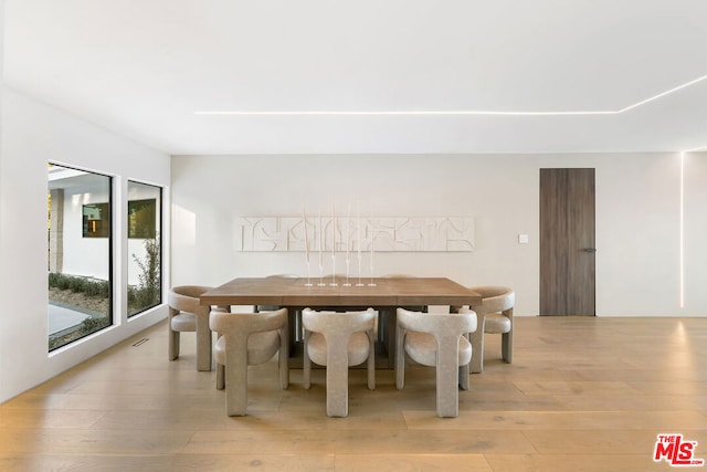 dining room featuring light hardwood / wood-style flooring