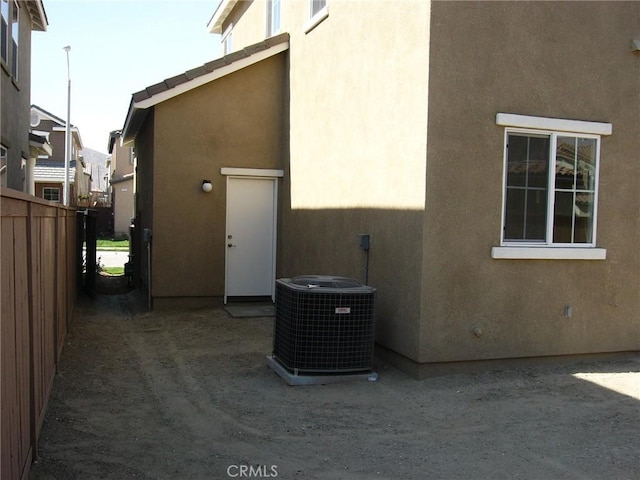 view of property exterior featuring cooling unit