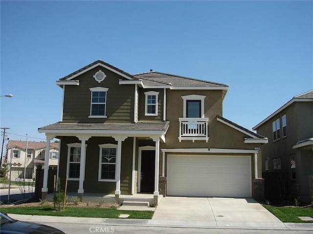 view of front facade with a porch and a garage