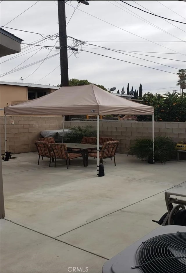 view of patio with central AC unit