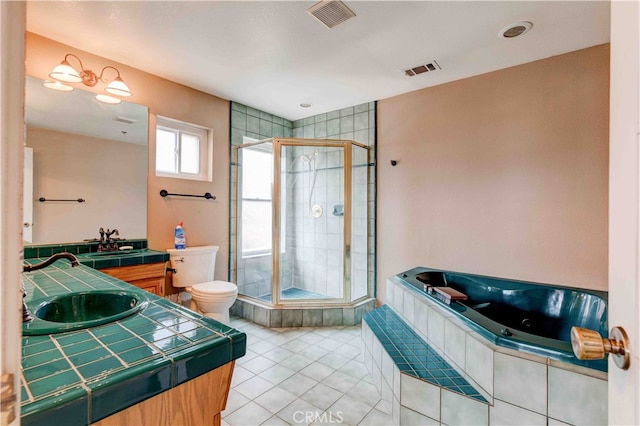 full bathroom with plus walk in shower, tile patterned floors, vanity, and toilet