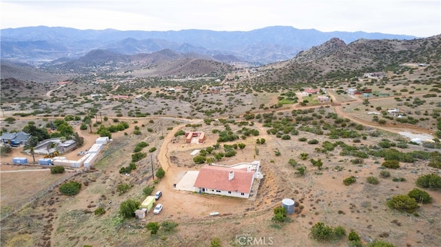 drone / aerial view featuring a mountain view