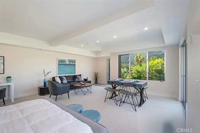 bedroom featuring light carpet