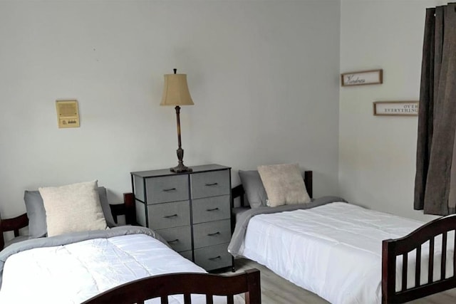 bedroom featuring light wood-type flooring