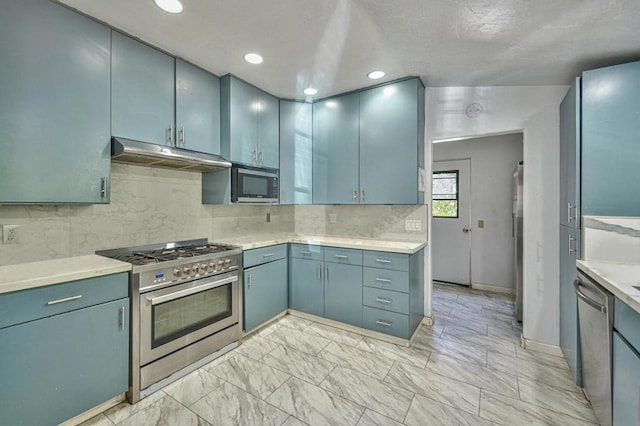 kitchen featuring decorative backsplash and appliances with stainless steel finishes