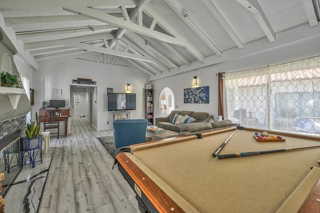 recreation room featuring hardwood / wood-style floors, high vaulted ceiling, beam ceiling, and billiards