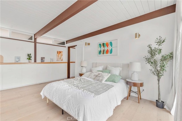 bedroom with wooden ceiling, beamed ceiling, and light hardwood / wood-style flooring