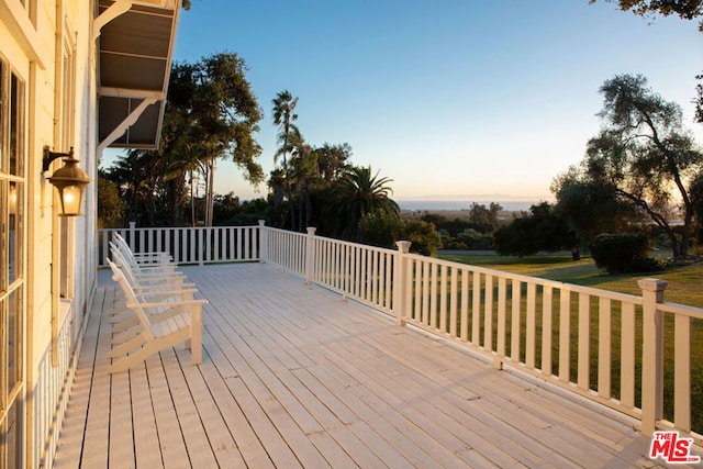 view of deck at dusk