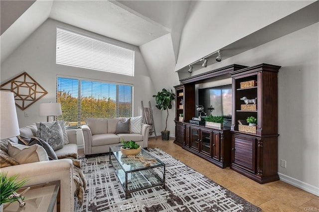 living room featuring a high ceiling and light tile patterned floors