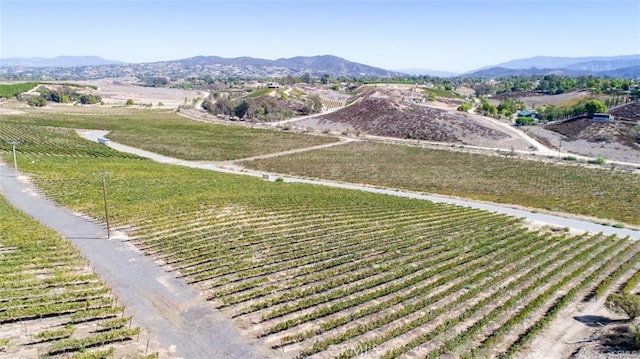 property view of mountains featuring a rural view