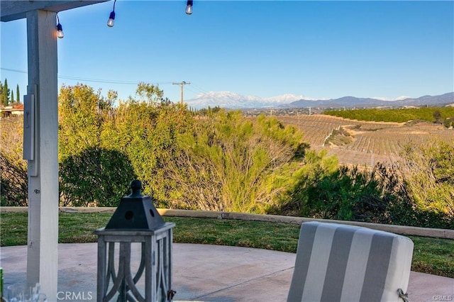 view of patio with a mountain view