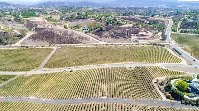 aerial view featuring a mountain view and a rural view