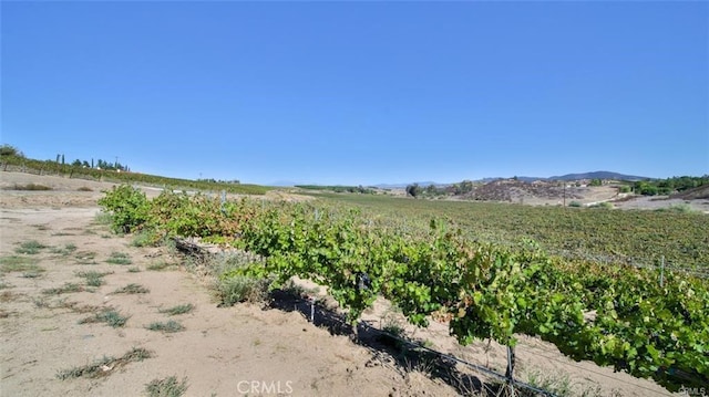 exterior space with a mountain view and a rural view