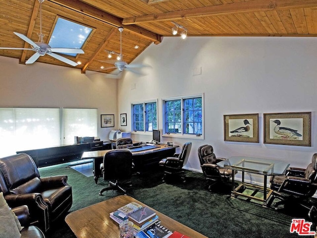 carpeted office with wood ceiling, a skylight, high vaulted ceiling, and ceiling fan