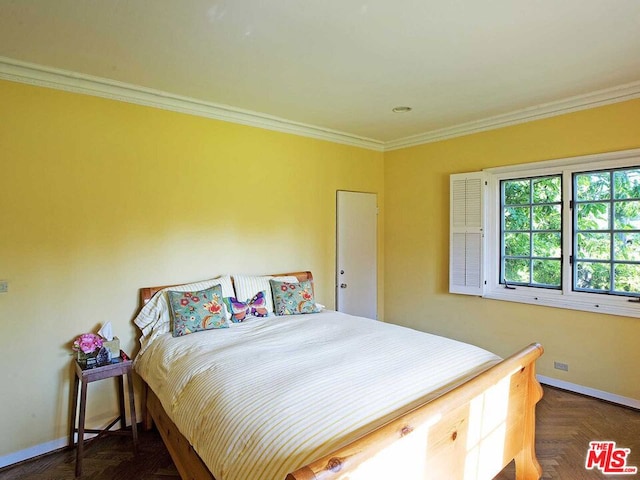 bedroom with crown molding and dark parquet floors