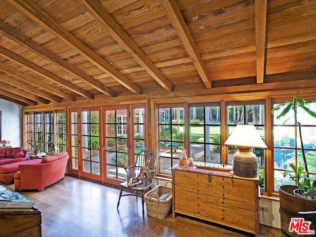 sunroom with french doors, lofted ceiling with beams, and wood ceiling