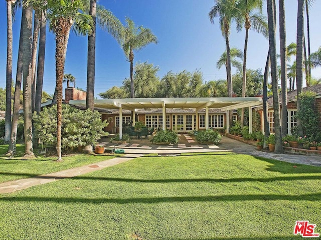 view of front of home with a front lawn