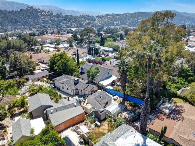 6843 Beckett St, Tujunga, CA 91042 - aerial perspective of suburban area with mountains