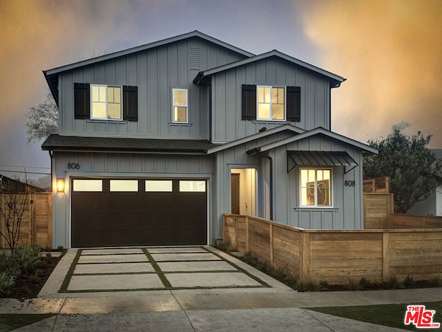 view of front of property featuring a garage