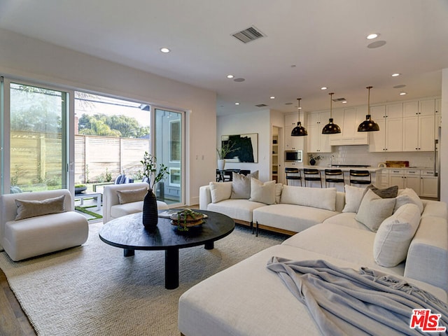 living room featuring light wood-type flooring