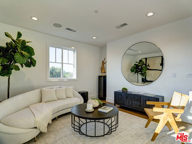 living room with light hardwood / wood-style floors