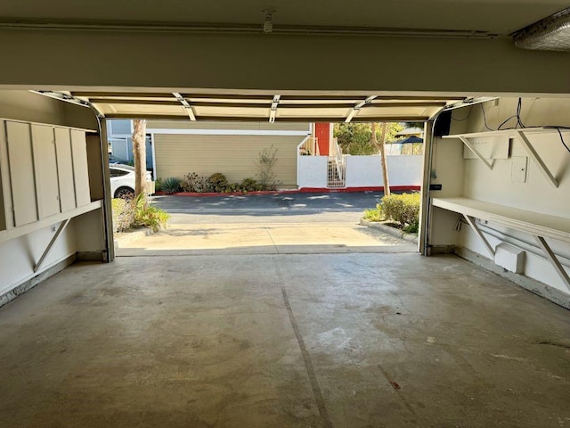 garage with a carport