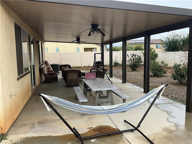 view of terrace featuring ceiling fan