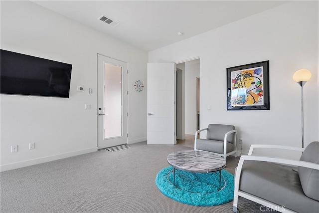 sitting room featuring carpet floors