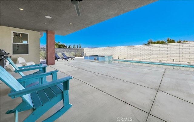 view of patio with ceiling fan