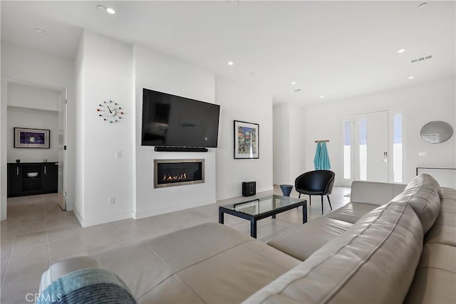 living room featuring light tile patterned floors