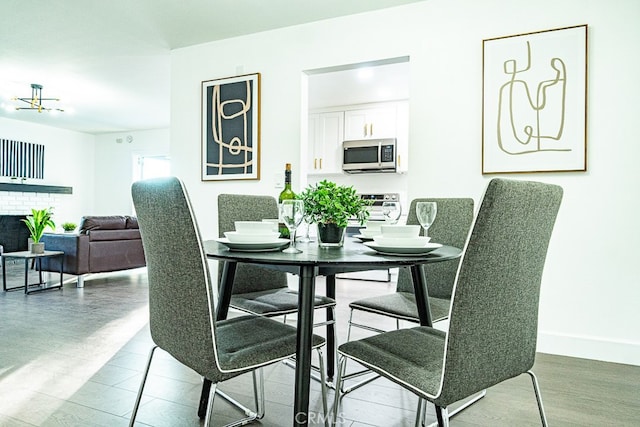 dining area featuring a fireplace