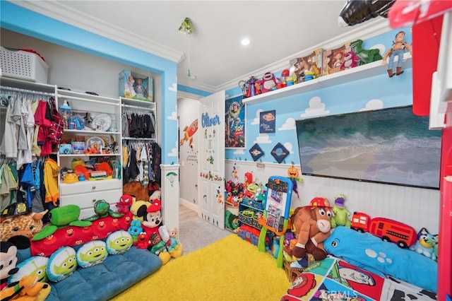 playroom with light carpet and crown molding