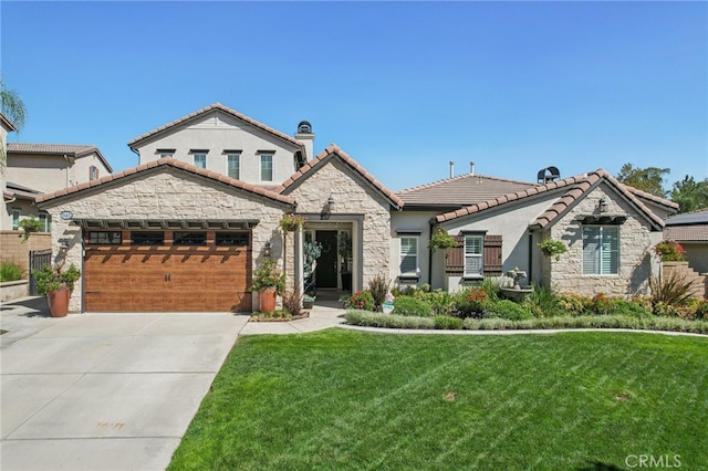 view of front facade with a garage and a front lawn