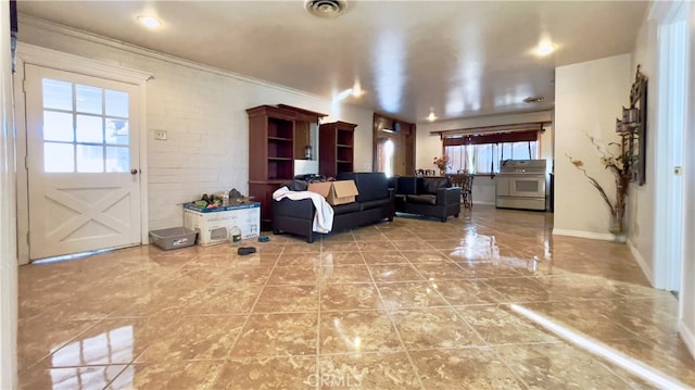 tiled living room with crown molding