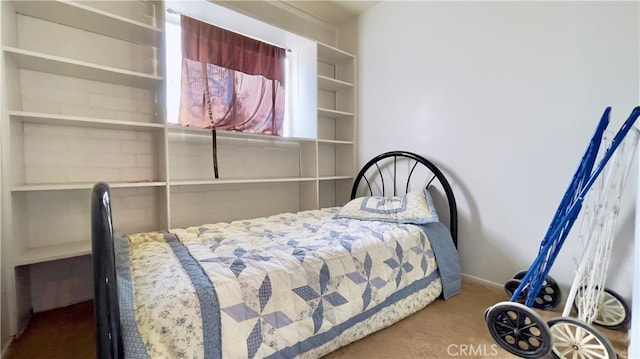 bedroom featuring carpet