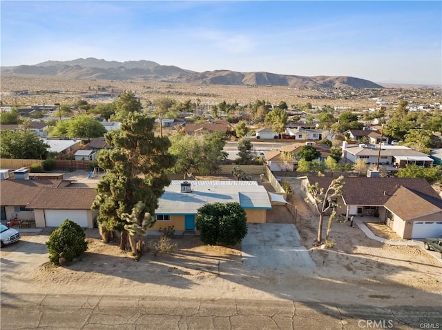 drone / aerial view featuring a mountain view