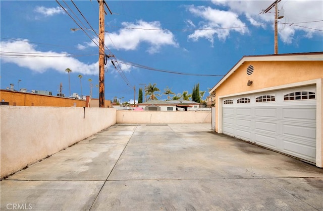 exterior space with a garage