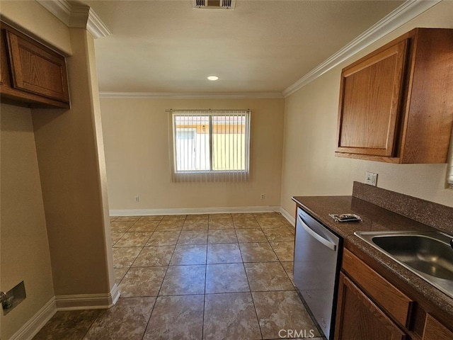 kitchen featuring crown molding, dishwasher, and light tile patterned flooring